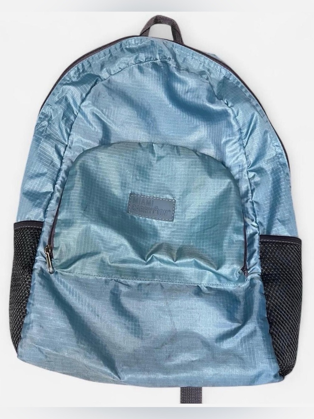 Miami Carryโ On blue water resistant backpack unisex